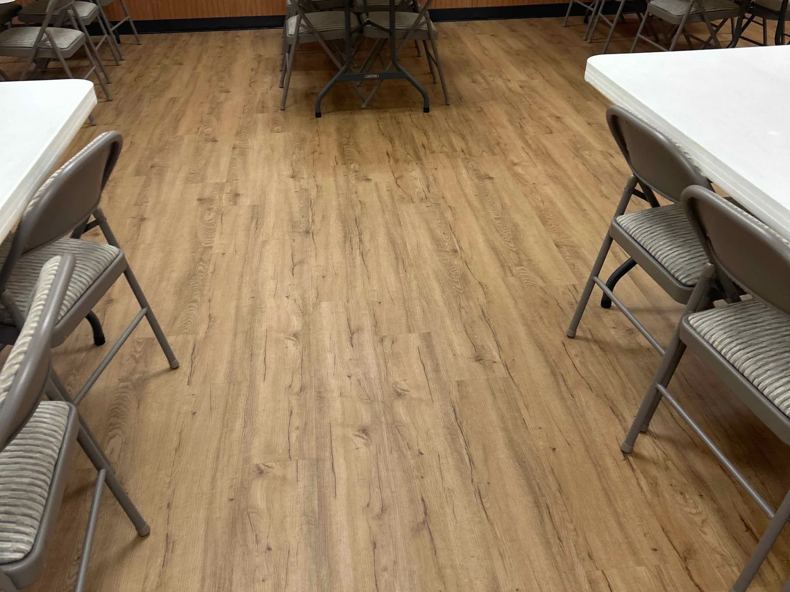 Clean event hall floor and table setup at American Legion Post 385 in Verona